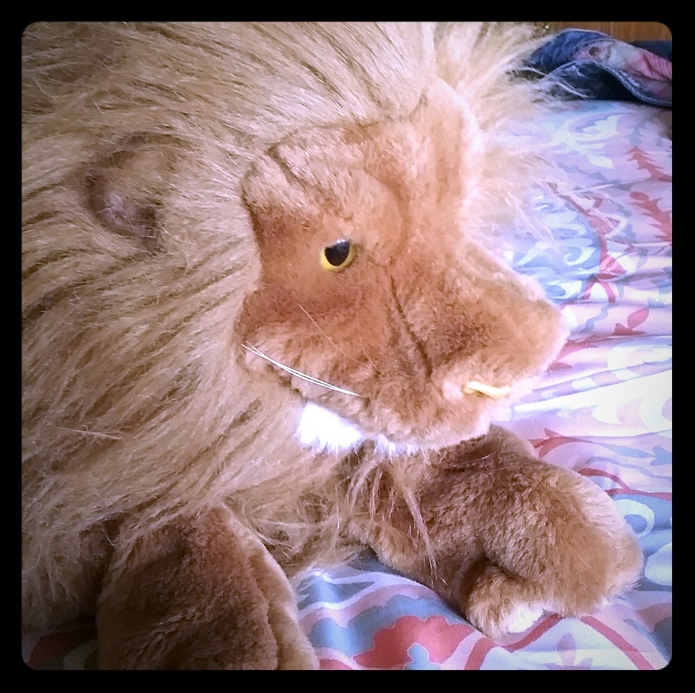 Plush lion hand puppet